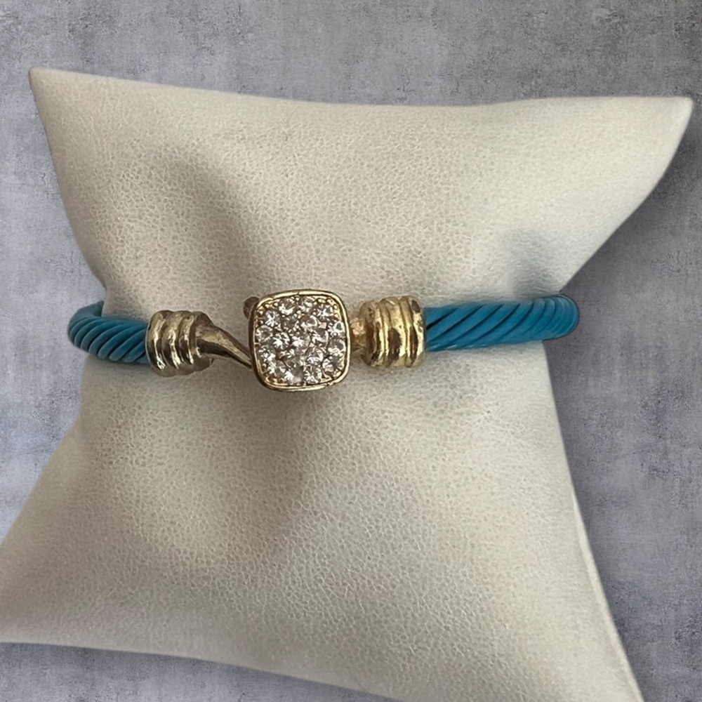 Blue enamel cuff bracelet with paved gold tone closure